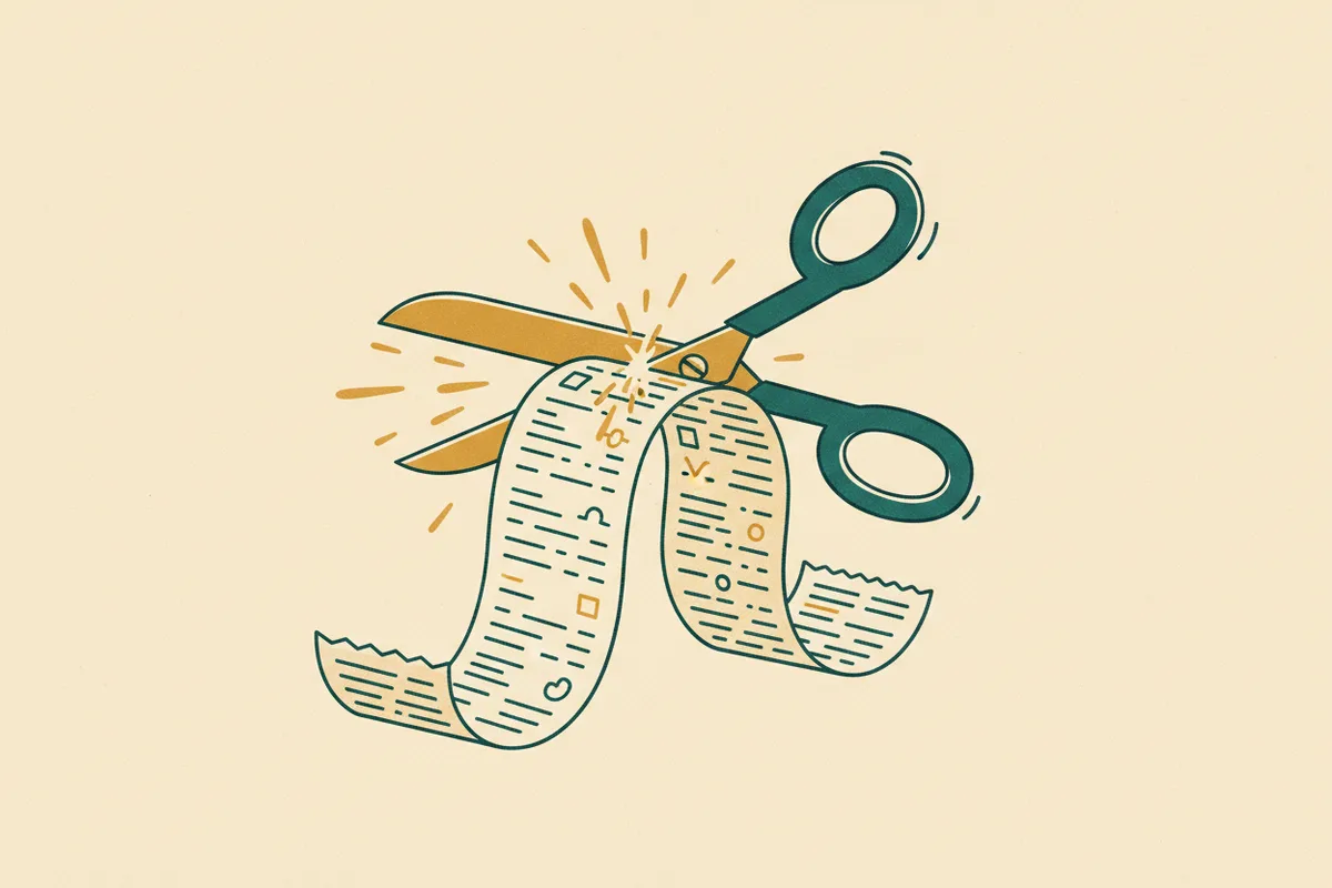 Illustration of scissors cutting a paper medical bill in half